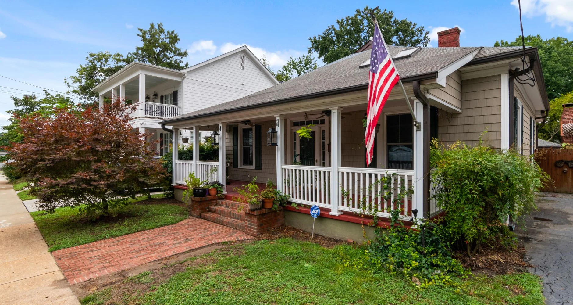 Classic American bungalow with a front porch and garden