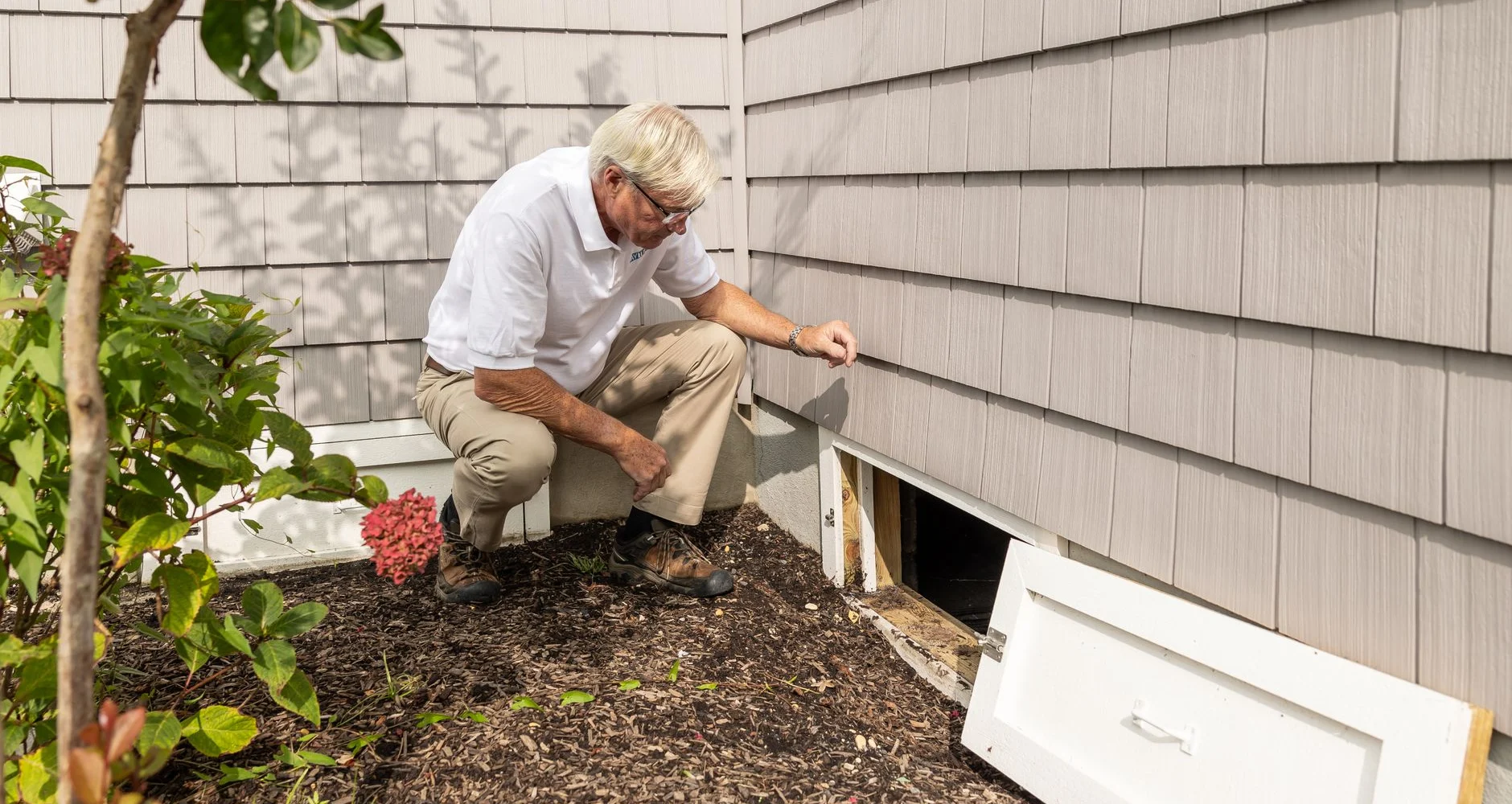 Crawl space under a raised wood floor