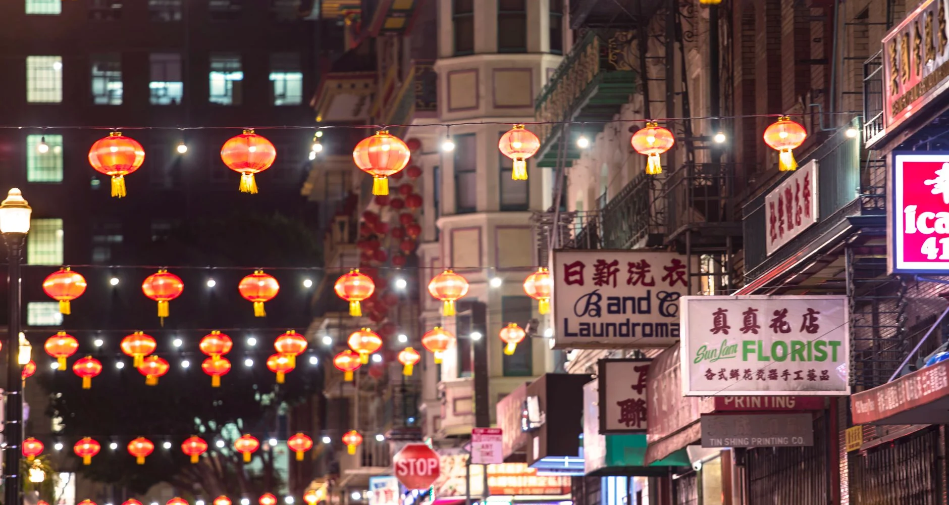 Chinatown street with red lanterns at night